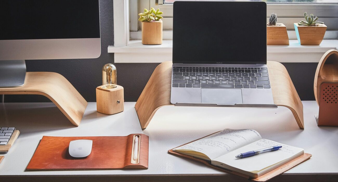 Free A stylish and contemporary home office setup with laptop and desk accessories. Stock Photo
